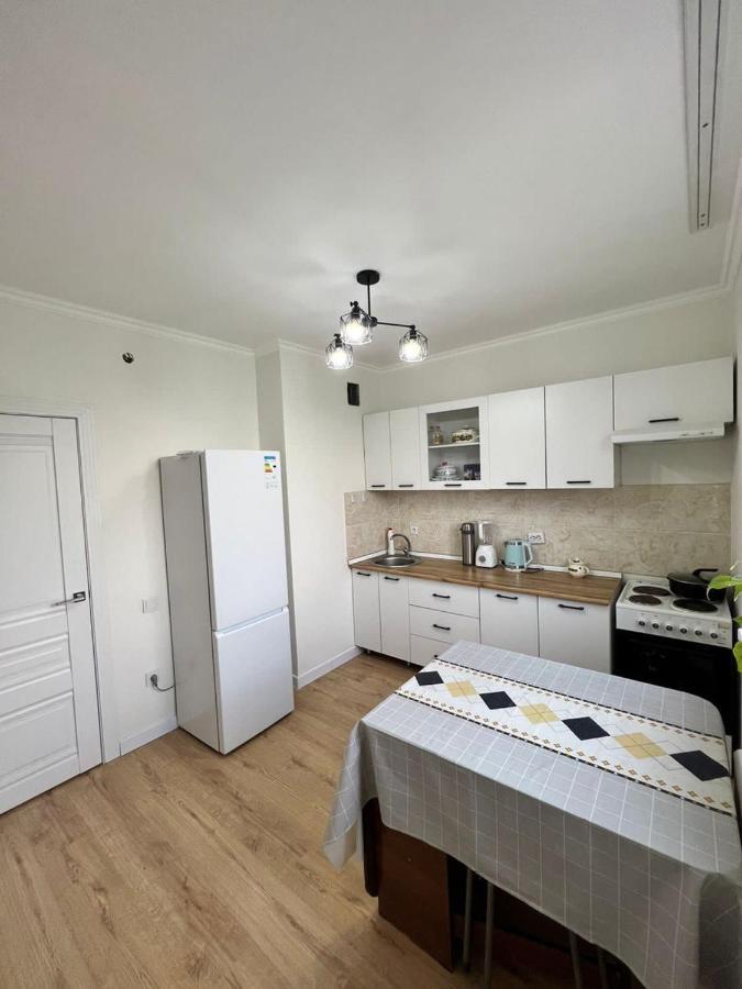 Apartment In อัลมาตี ภายนอก รูปภาพ